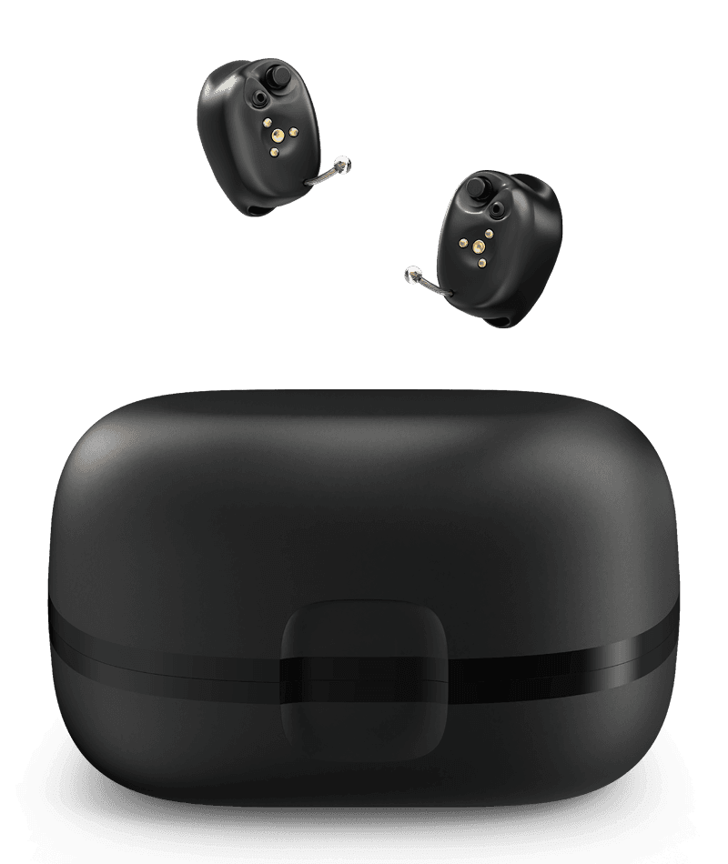The Starkey Signature Series completely-in-canal rechargeable hearing aids resting in their portable charging case